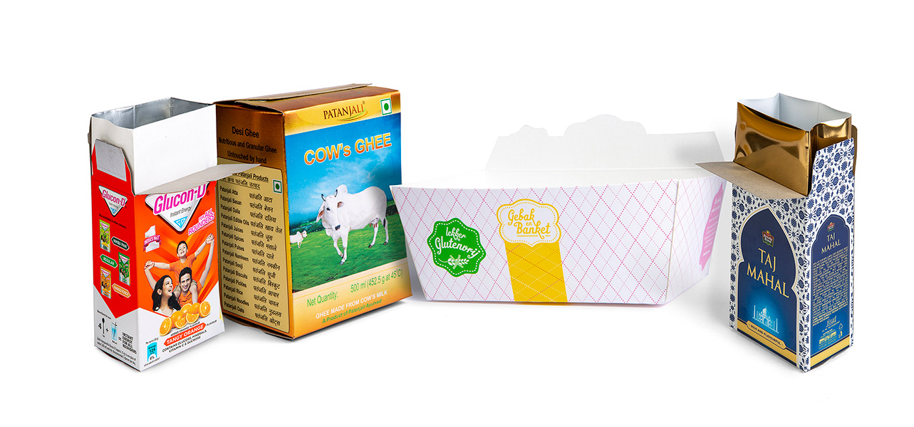 High-definition display of Indian branded cartons including Glucon-D, Patanjali Cow's Ghee and Taj Mahal Tea